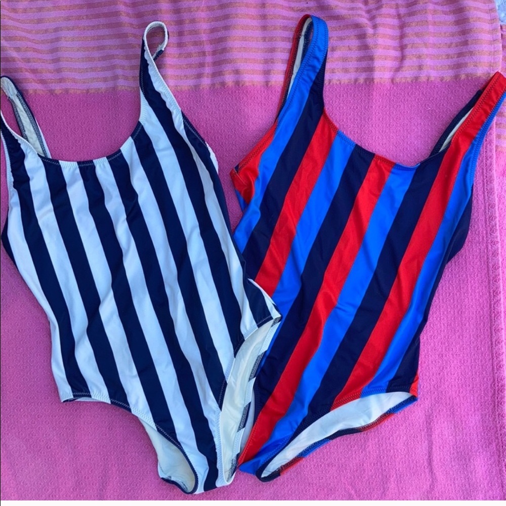 two solid and striped one piece bathing suits
